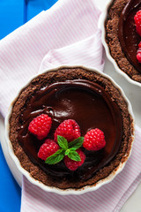 Chocolate raspberry tarts mint leaves
