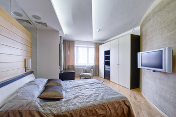 Modern interior of a bedroom in the new house.
