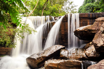 Landscape of small waterfall in the tropical rain forest
