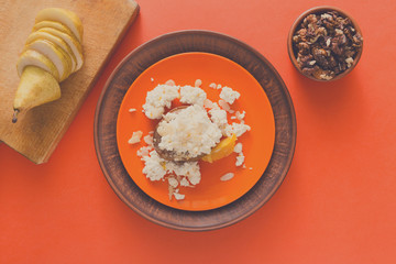 Healthy breakfast - cottage cheese, nuts and fruit