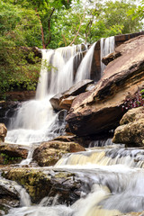 Landscape of small waterfall in the tropical rain forest