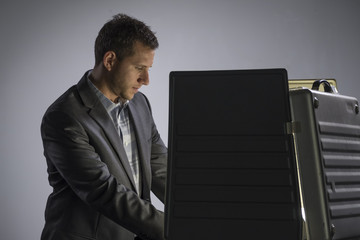 Man voting in a booth