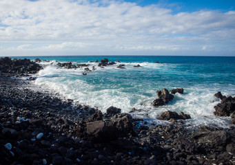 Lava rocks in ocean Hawaii