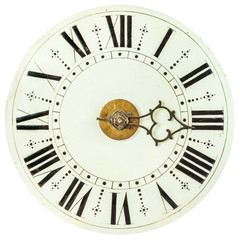 Old clock face with roman numbers