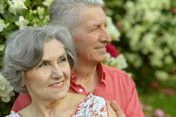  senior couple hugging 