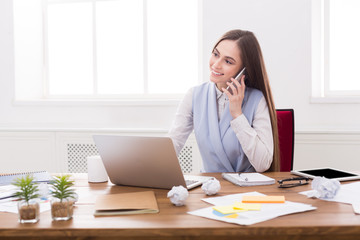 Business talk, woman consulting by phone at office