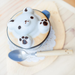 Obraz na płótnie Canvas Teddy bear milk foam on hot latte (3d latte art)