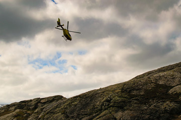 Naklejka na ściany i meble Helicopter on the Mountain