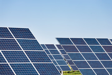 Obraz premium Solar panels against blue sky background