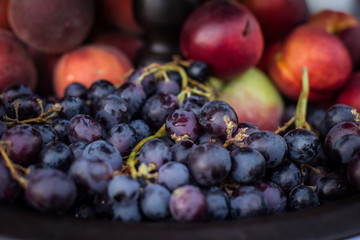 Autumn set of beautiful grape composition on a wooden table