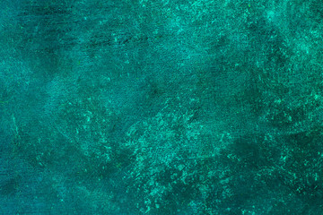 Alter beunruhigter blauer Türkis verrosteter Messinghintergrund mit rauer Beschaffenheit. Befleckte, Gradienten-, Zement- oder Steinoberfläche. © olindana