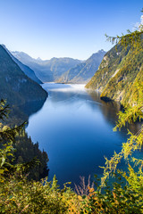 Lake Koenigssee with tourist boats in fall, Bavaria, Germany