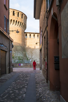 Dozza, Bologna, Emilia Romagna, Italy, Europe. The tower of a medieval fortress from alley.