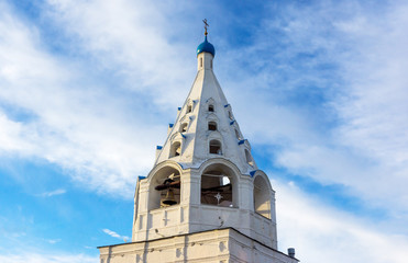 Fototapeta premium bell tower of the Assumption Cathedral in Kolomna, against a beautiful sky