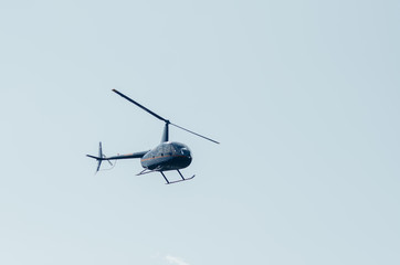 Fototapeta na wymiar Flying helicopters in the sky.