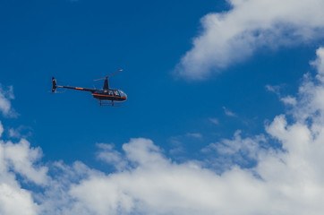 Fototapeta na wymiar Flying helicopters in the sky.
