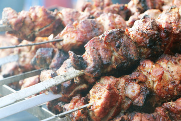 Shish kebab on skewers in smoke