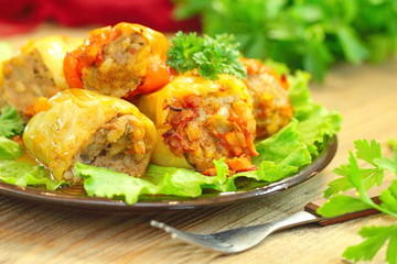 Baked peppers stuffed with meat, rice and vegetables