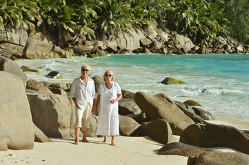 couple walking    at tropical beach