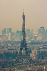 Fog in Paris with Eiffel tower and Defense