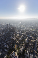 Sunny afternoon aerial view of urban streets and towers in downtown Los Angeles, California. 
