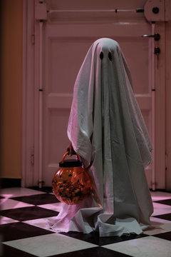 Portrait of a Boy Dressed Up as a Ghost for Halloween