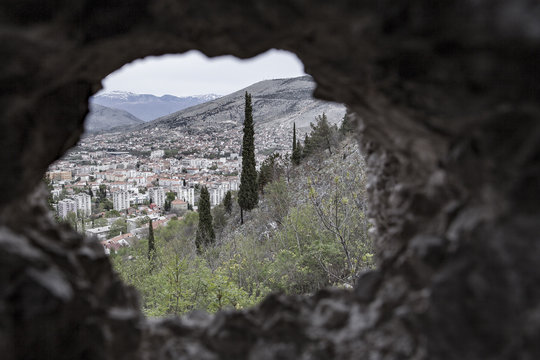 Eastern Europe, Bosnia and Herzegovina. Mostar view from the hole of a bomb of the war in the Balkans