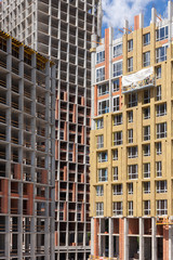 Fototapeta premium External wall insulation. Solid wall insulation. Energy efficiency house wall renovation for energy saving. Exterior house wall heat insulation with mineral wool, building under construction.