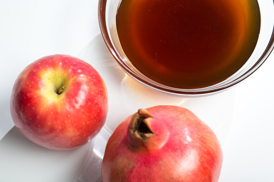 Apple and pomegranate with hunny