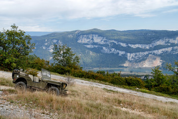 antique military vehicle in the mountain