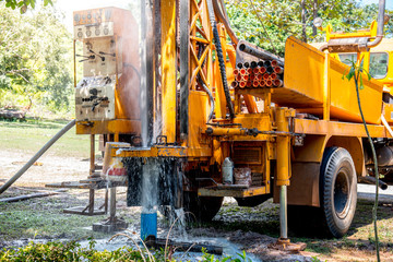 Ground water hole drilling machine installed on the old truck in Thailand. Ground water well...