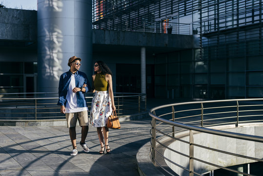 Couple walking in city