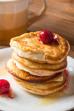 Homemade Pancakes with Cherry Cinnamon and Honey for a Breakfast