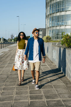 Couple walking in city