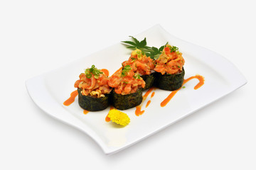 Spicy salmon shushi, Spicy salmon rolls in white plate on white background