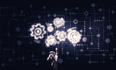 Glowing cogwheel mechanism icon on dark background as symbol of 