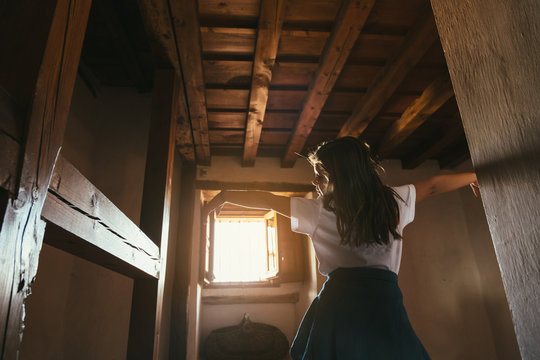 Little Sad Girl Dancing in a Rural House