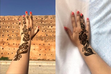 Oriental patterns. Patterns of henna on the hand of a young girl.