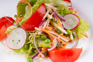 Sliced herring and radishes with sauce