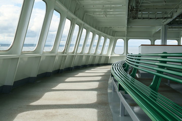 Obraz premium Indoor seating bench at front of ferry boat
