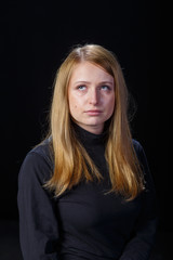 Naklejka premium Sad young girl blonde hair crying