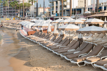 Rows of empty beach lounges in Juan les Pins, France