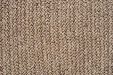 beige color wool knitted fabric background texture