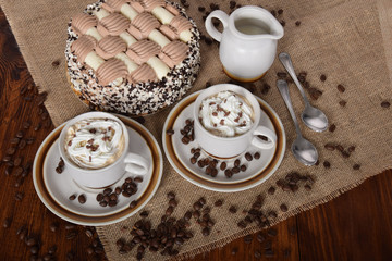 coffee with whipped cream and chocolate and coffee with cream cake
