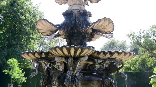 Historic fountain. Fountains were originally purely functional, connected to springs or aqueducts and used to provide drinking water and water for bathing and washing to the residents of cities, towns