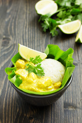 Yellow curry with chicken and rice. Asian cuisine.