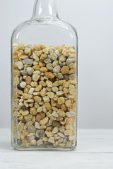 bottle with decorative stones