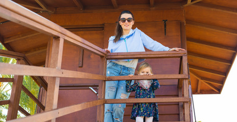 Portrait of smiling mother and daughter