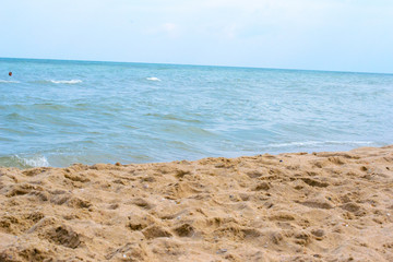 sun of summer time on sky and sand of beach. Black sea