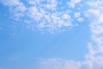 blue sky background with tiny clouds